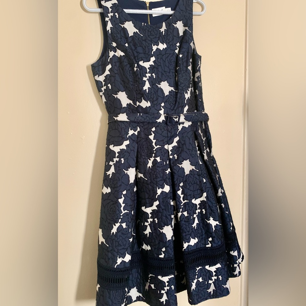 Blue and white formal dress with small attached petticoat. Size 8.